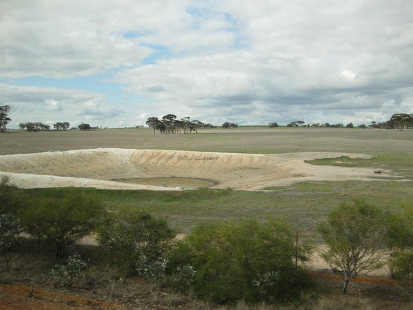 n_img_4258__a__dam__to_collect_what_little_water_flows_off_a_field.jpg