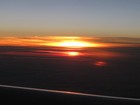 IMG_2441 W. of Ireland, sunrise, 38,000', 574 mph, -62 F.JPG