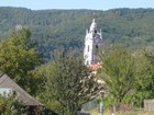 IMG_2627 Durnstein on the Danube.  Monastery Church.  Baroque tower is from 1733.JPG