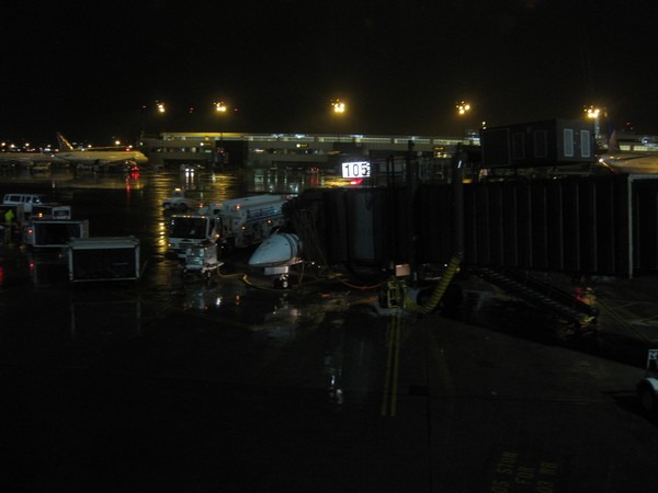 n_img_4249_leaving_newark__ny_for_moncton_at_7_pm__jetway_105_looks_like_a_long_necked_animal_eating_our_little_aricraft.jpg