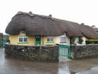 IMG_3335  Adare more of many thatched cottages.JPG