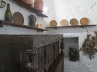 IMG_3400  Bunratty Castle.  Kitchen counter and storage.JPG
