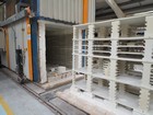 IMG_3779  The kiln drives over the rack of pottery.JPG