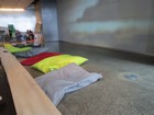IMG_3976  Big comfy cushions to lie on to watch the videos in the Visitors Centre.JPG